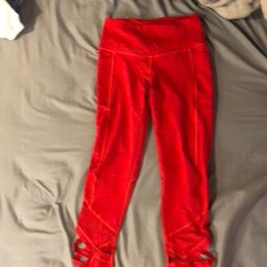 Red Victoria Sport leggings.